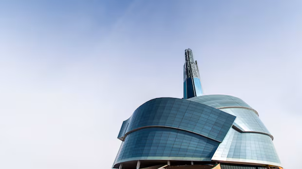 Human rights museum board member resigns over 'one