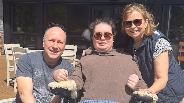 Calgary family shocked to discover their daughter, with severe brain injury, is being moved off AISH
