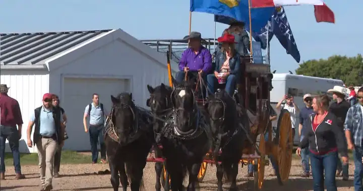 Canada, Alberta flags fly high at town parade during separatism debate