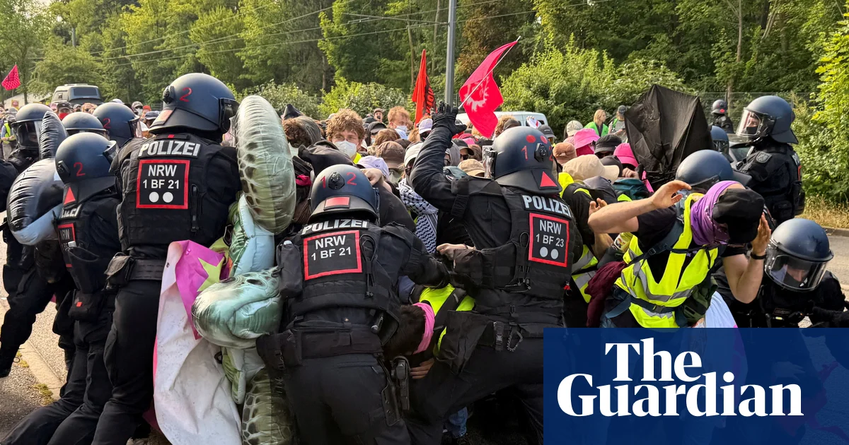 German riot police clash with protesters hoping to block far