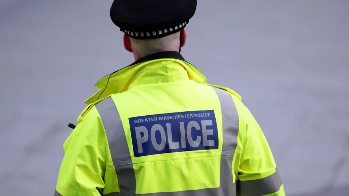 Two arrested for obstructing police helping crash victim