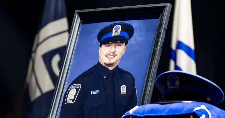 Police from across Canada honour fallen Montreal officer in massive funeral procession