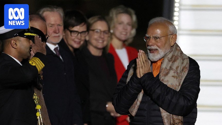 Modi met with support and human rights protests as he arrives in Melbourne