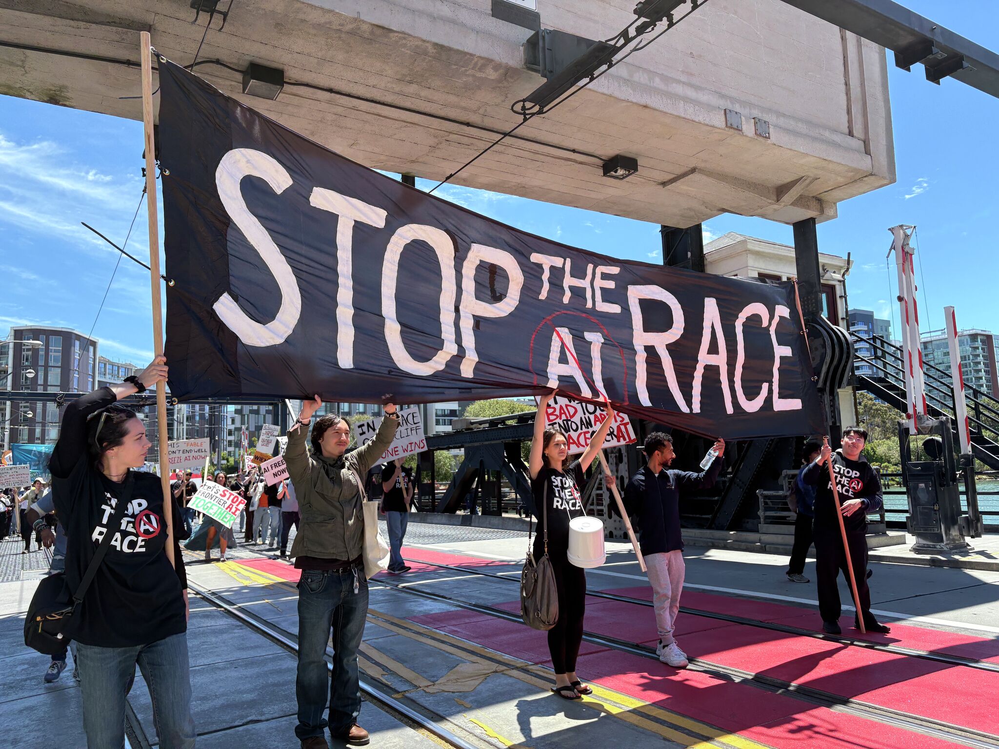 S.F. protesters march on OpenAI, Anthropic and Google DeepMind to demand: ‘Stop the AI race’