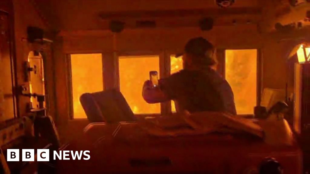 Train 'encased in flames' in Canada wildfire