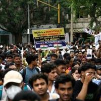 Indian police fire tear gas at exam protest march