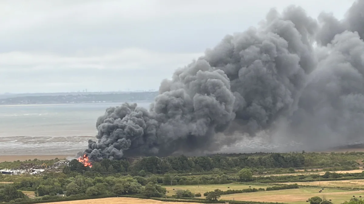 Dozens of firefighters at scene of scrapyard blaze