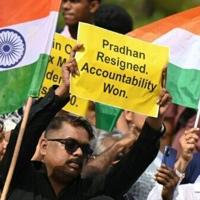 India activists demand release of detained 'cockroach' protesters