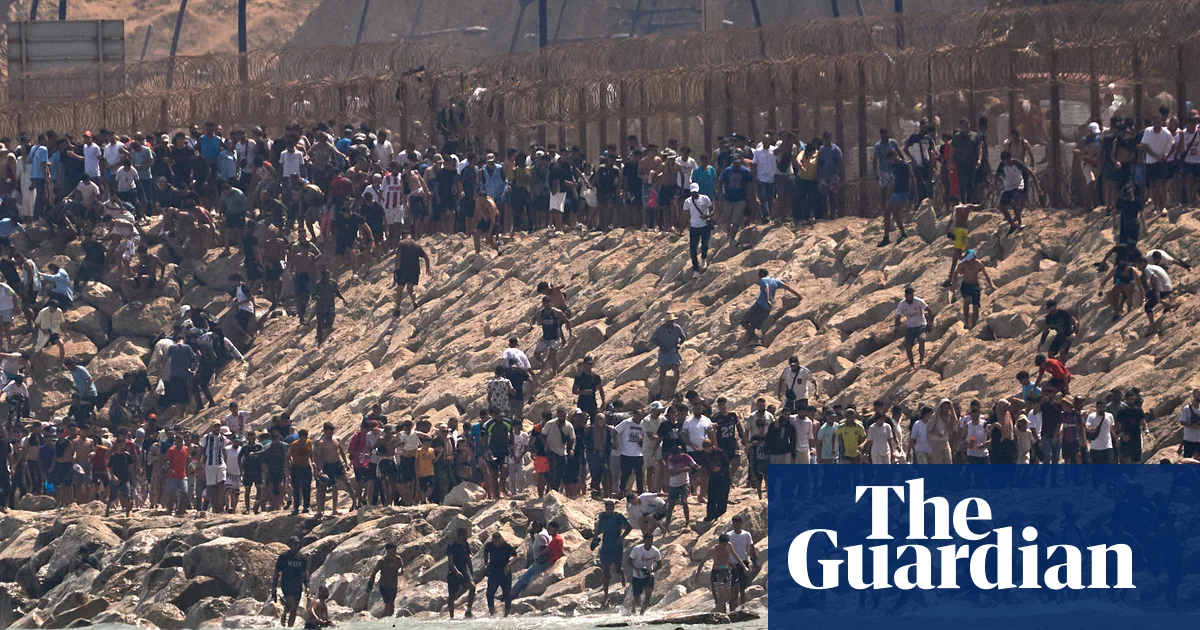 Why is Ceuta a migration flashpoint and how were so many people able to cross from Morocco?