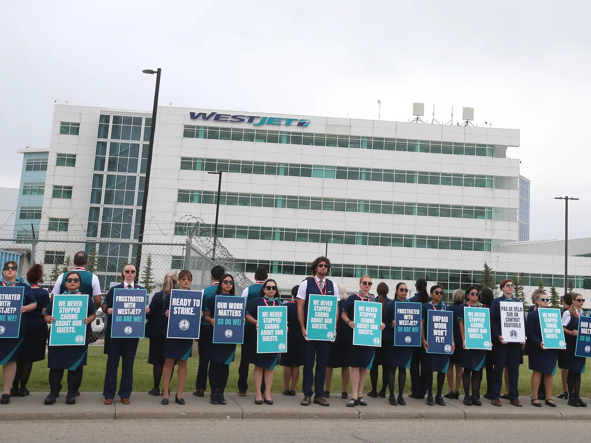 Striking WestJet flight attendants say 13% pay bump, 'duty pay premium' for pre
