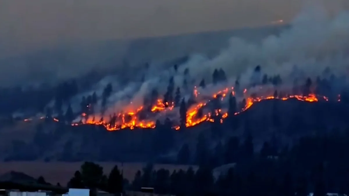 Wildfire erupts beside highway near Vernon