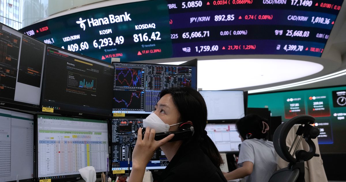 US stocks edge down from their record after oil prices climb 5%