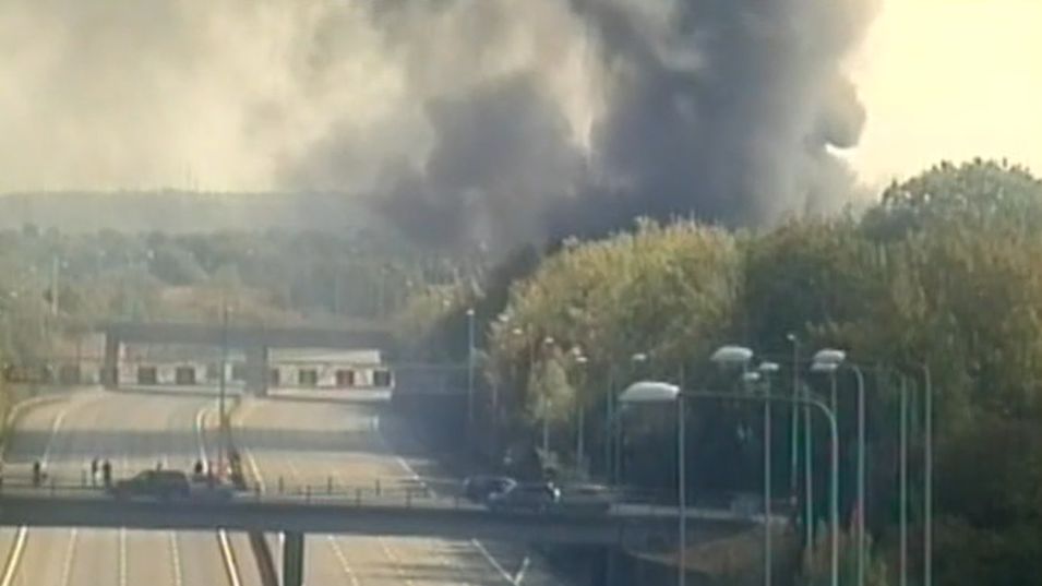 Smoke from warehouse fire closes section of M25