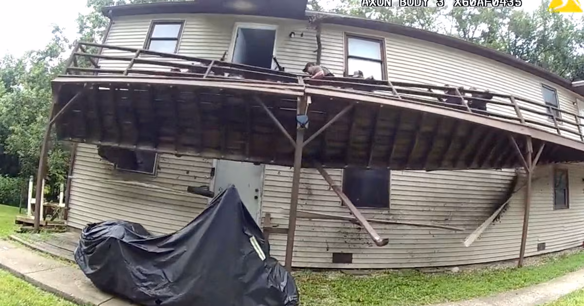Watch the moment a deck collapses under officers during a SWAT raid