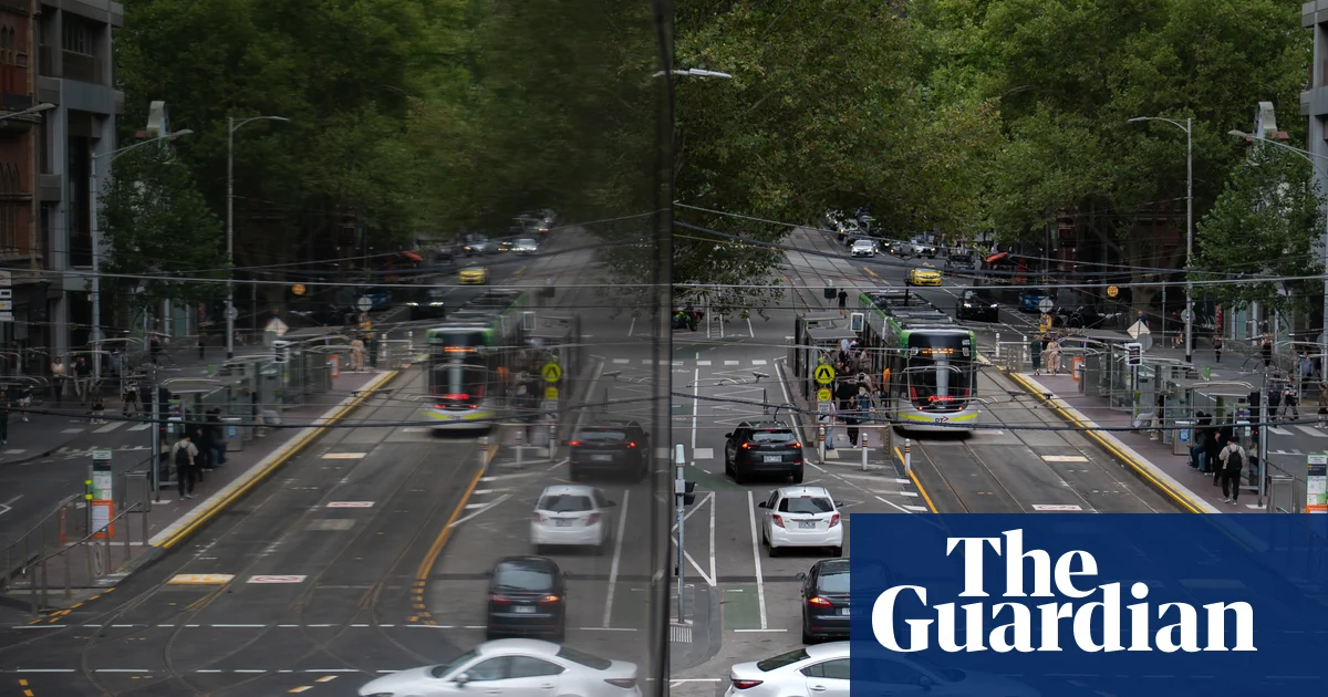 Woman allegedly repeatedly stabbed with scissors while protecting son from ‘random’ Melbourne CBD attack