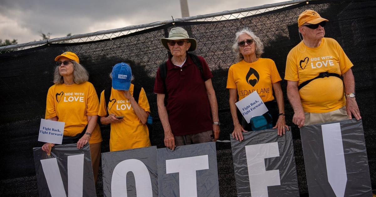 Thousands march in Washington to defend voting rights, in photos