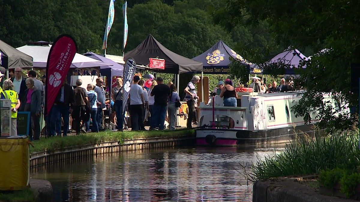 Hundreds attend canal festival at site of breach