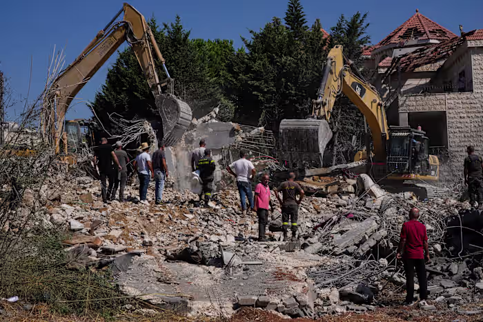 Israeli airstrikes hit a Lebanese village, killing 9, and other Mideast developments