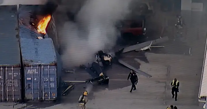 Helicopter crashes and bursts into flames, killing at least 3 people near an LA bus collision