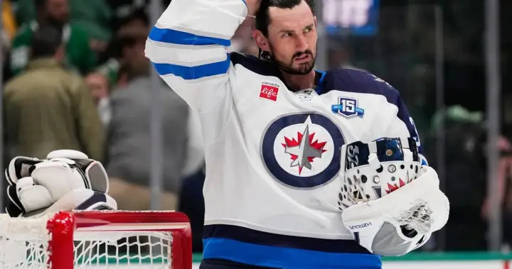 Winnipeg Jets suspend Connor Hellebuyck after he fails to report to training camp
