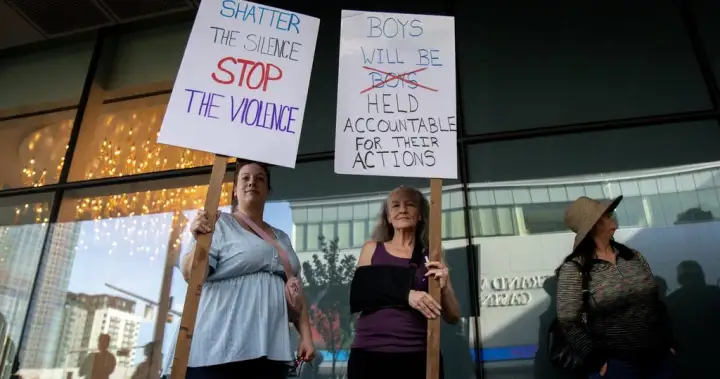 Protesters gather in Edmonton before Oilers game