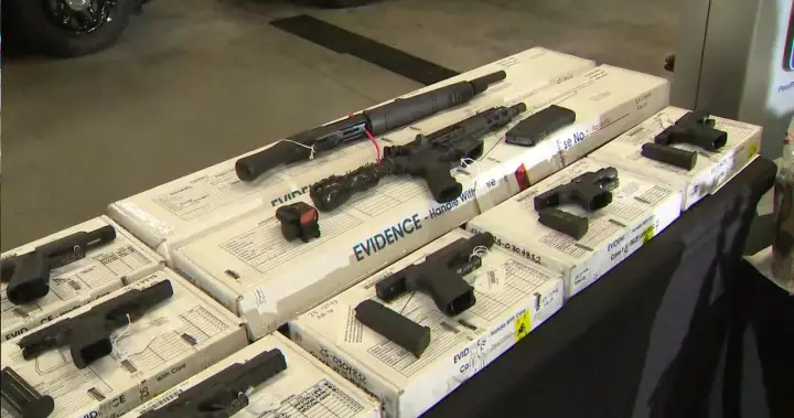 23 guns seized in GTA firearms trafficking investigation with cross