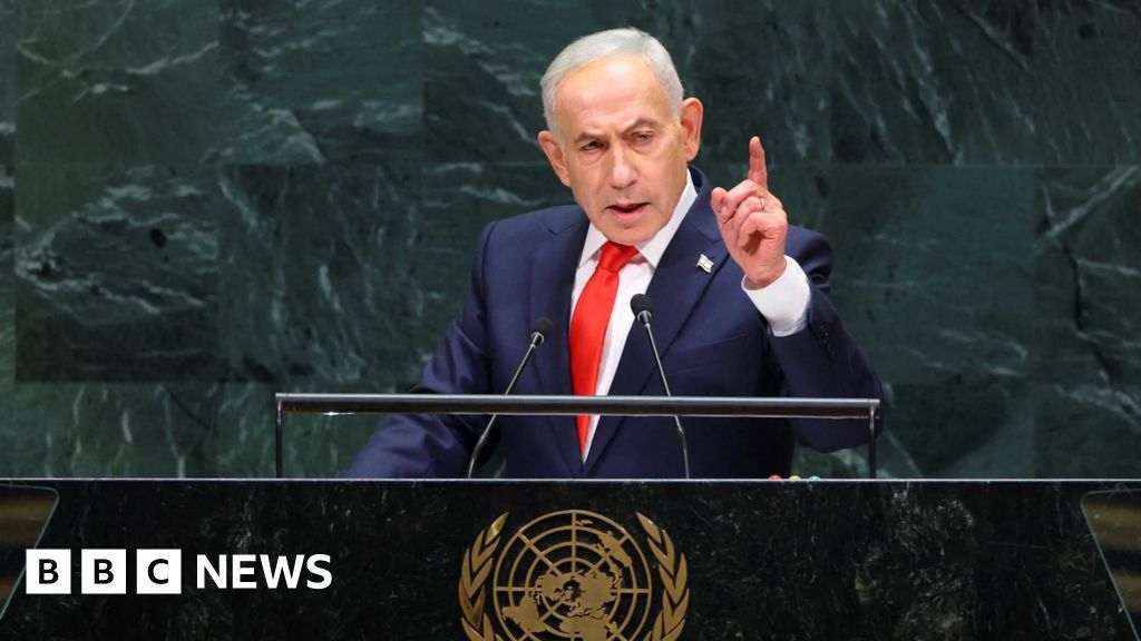 Netanyahu defends Israeli military action as delegates walk out before UN speech