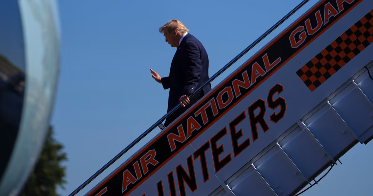 CNN says it was left off Air Force One for Trump’s Saturday trip to a college football game
