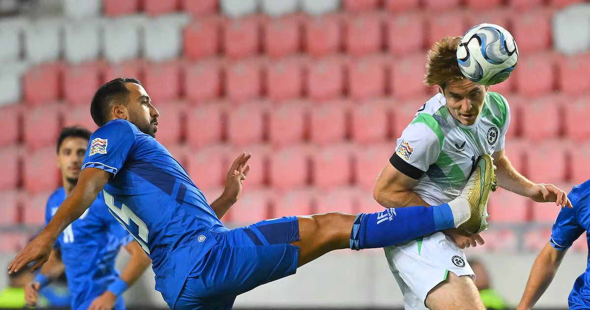Ireland players wear black armbands and refrain from handshakes in soccer game against Israel