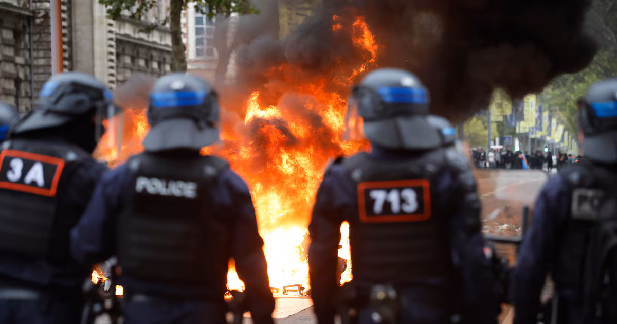 Attackers douse teacher in gas as students protest across France
