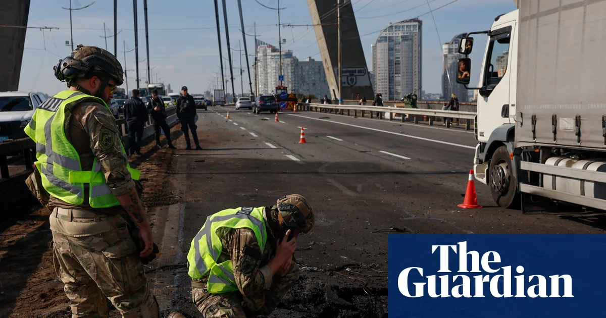 Russia strikes Kyiv bridge as German chancellor visits Ukraine in show of support